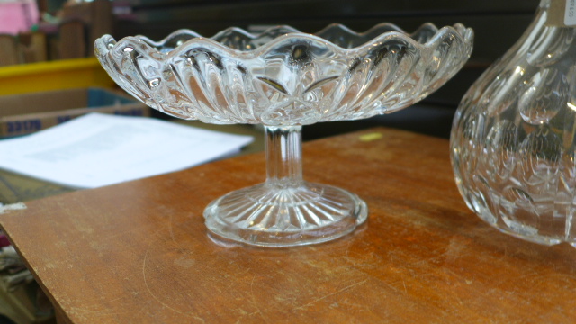 Cut glass circular fruit bowl on plinth and a cut glass port decanter