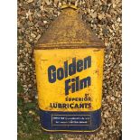A Golden Film Superior Lubricants pyramid can.