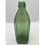 A BP Luxus Petrol square glass bottle.