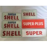 Six glass Shell petrol pump brand inserts.