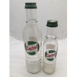 A Wakefield Castrol Motor Oil XL Grade quart glass oil bottle and a Castrol pint oil bottle.