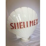 A Shellmex glass petrol pump globe by Hailware, slight fading and chipping to neck.