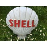 A Shell glass petrol pump globe, damaged with crack.