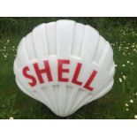 A good Fat Shell glass petrol pump globe with bright red lettering, in good condition.