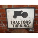 A Tractors Turning road warning sign, 19 1/2 x 15 1/2".
