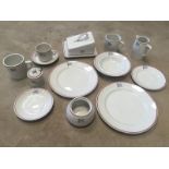 A collection of Duraline Hotelware with Esso branding comprising butter dish, a part teaset and a