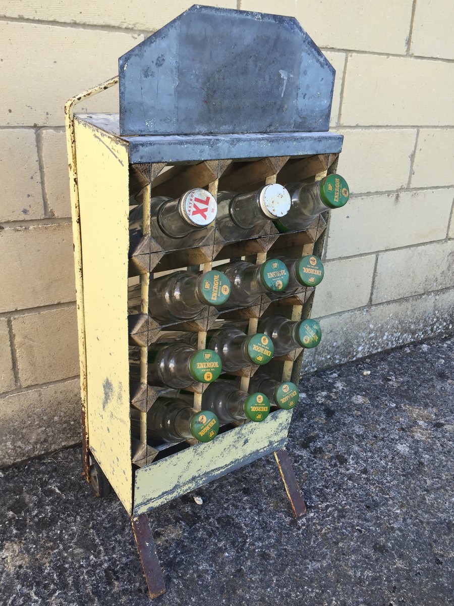 A BP Energol forecourt oil bottle crate containing 12 oil bottles.