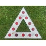 A cast aluminium triangular road sign pediment with integral red glass reflectors, 18 x 15 3/4".