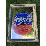 A Petroyle Upper Cylinder Lubricant advertising mirror, 10 3/4 x 15 3/4".