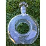 A rare cut glass decanter in the shape of a tyre, engraved with the legend: 'When Tyred Scotch'.