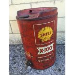 A Shell X-100 Motor Oil five gallon drum with dispensing tap.