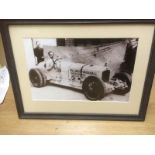 A framed and glazed print showing Raymond Mays in a Vauxhall Villiers in 1930, this car was based on