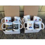 Eight Elf and Total ceramic mugs with advertising.