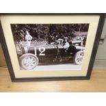 A framed and glazed print showing a Bugatti Type 35 at the Monaco grand prix, owner/driver W. Grover