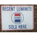 A 'Regent Luminite Sold Here' double sided enamel sign with hanging flange and central globe