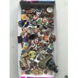 A good collection of enamel and other lapel badges, AA keys, cap badges etc.