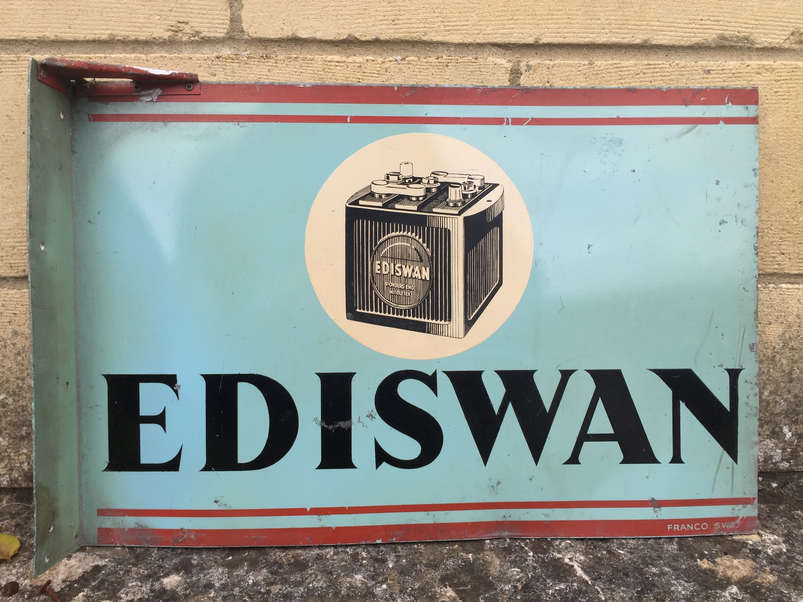 An Ediswan Batteries aluminium double sided advertising sign with hanging flange, by Franco, 18 x