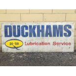 A Duckhams 20-50 Lubrication Service rectangular aluminium advertising sign, 58 x 24".