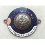 A blue and white enamel supply plate for City Motors, Oxford and Reading, with central St.