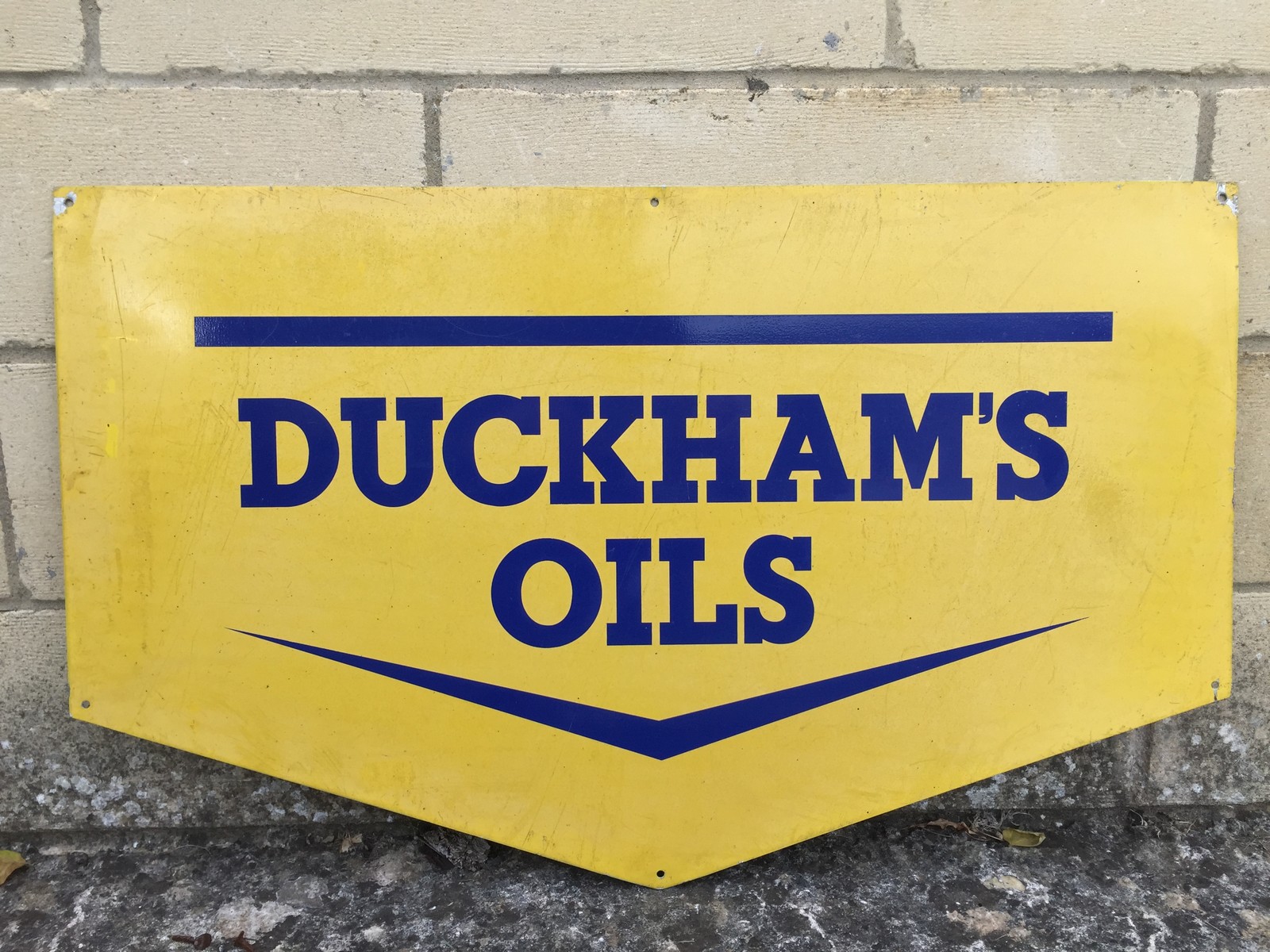A Duckham's Oils shaped aluminium advertising sign, 27 1/2 x 70".
