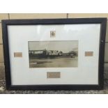 An oak framed and glazed photograph of a standard Leyland RAF flatbed lorry salvaging a crashed