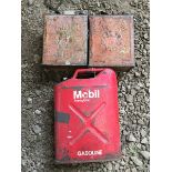 A Mobiloil Trans Globe Essolene can and two 2-gallon petrol cans, both Shell.