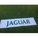 A Jaguar plastic banner, 138 1/2 x 34 1/2".