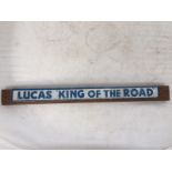 A Lucas King of the Road shelf strip mounted on wood.