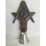 An unusual Masonic car badge.