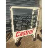 A Castrol forecourt oil bottle rack.