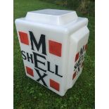 A Shellmex glass petrol pump globe with black lettering and red squares to each corner, stamped '