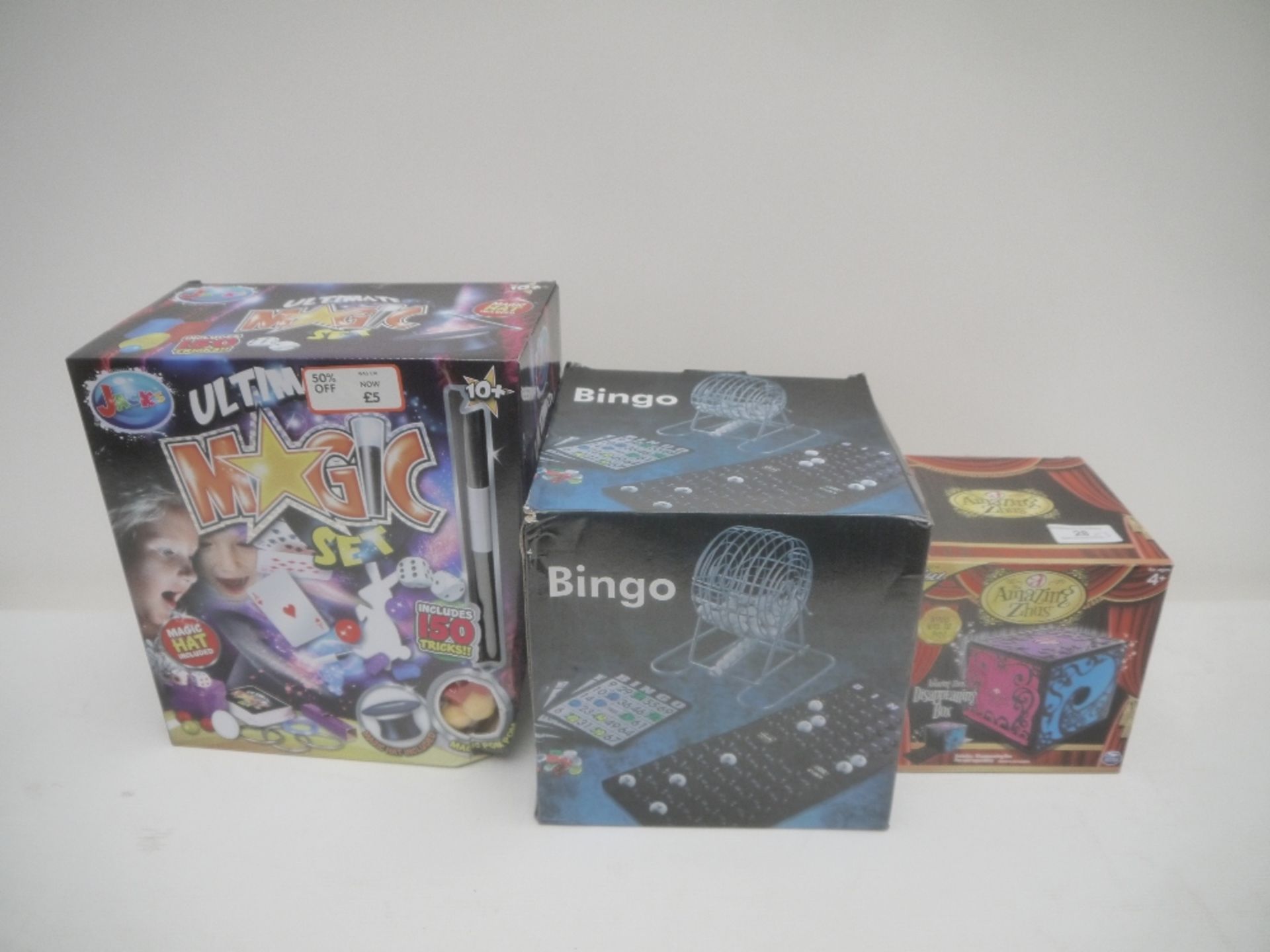 3x Toys in the Lot, being the following; 1x TheAmazingZhus Disappearing Box, 1x Classic Bingo Game &