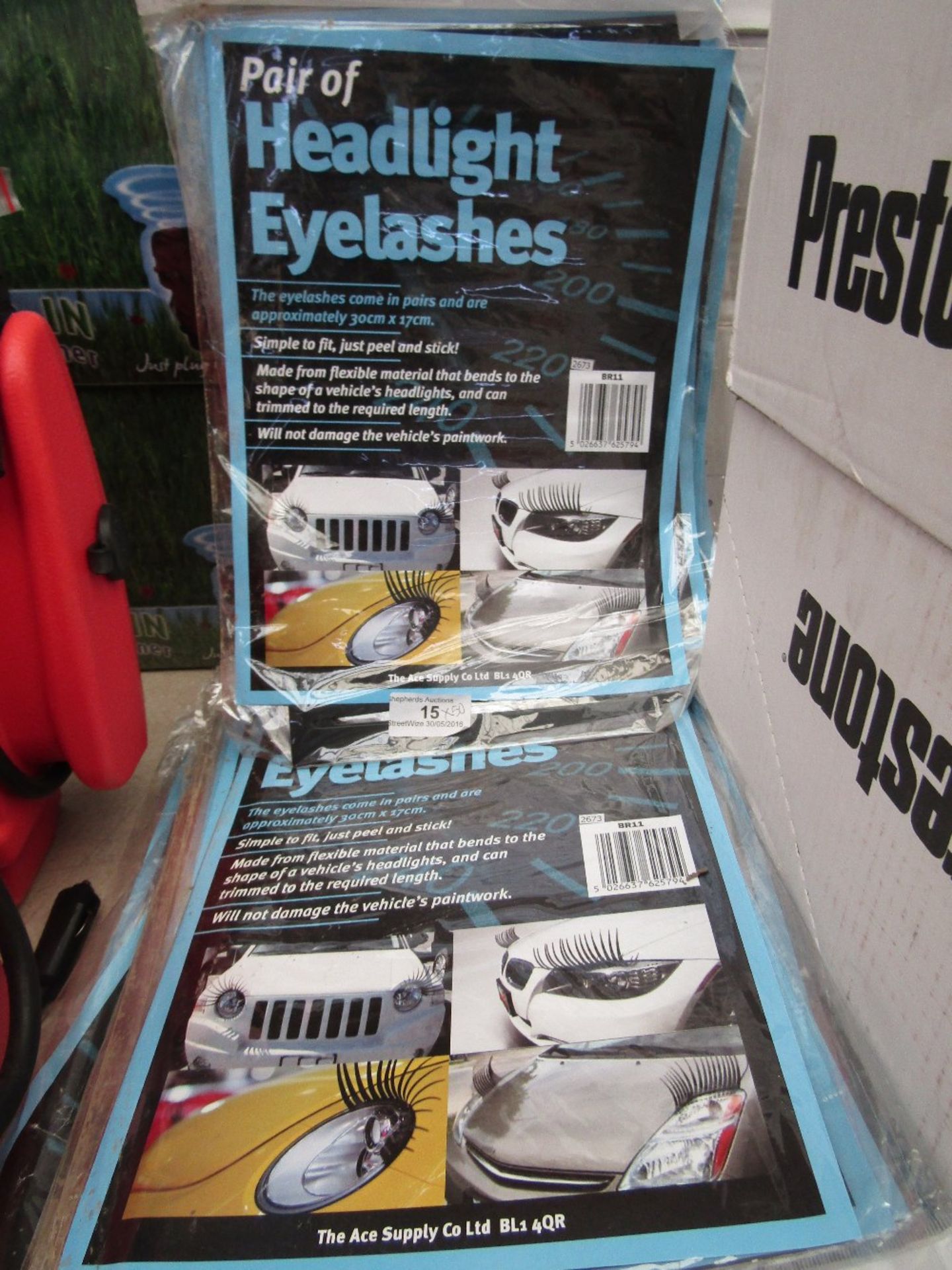 Approximately 50 StreetWize Headlight Lashes. New, in original packaging.