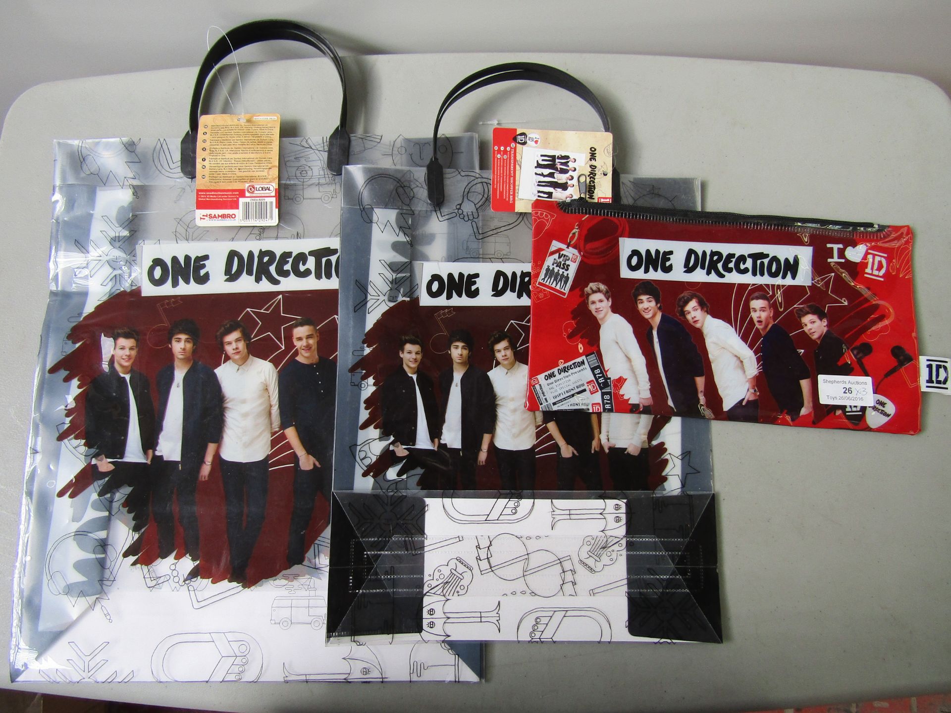 3x Items Being: - 2x One Direction Transparent Shopper Bags - 1x Large Pencil Case.