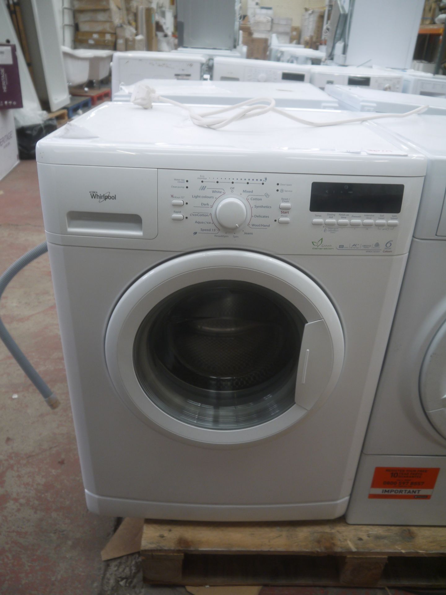 Whirlpool washing machine, 8kg, powers on and spins.