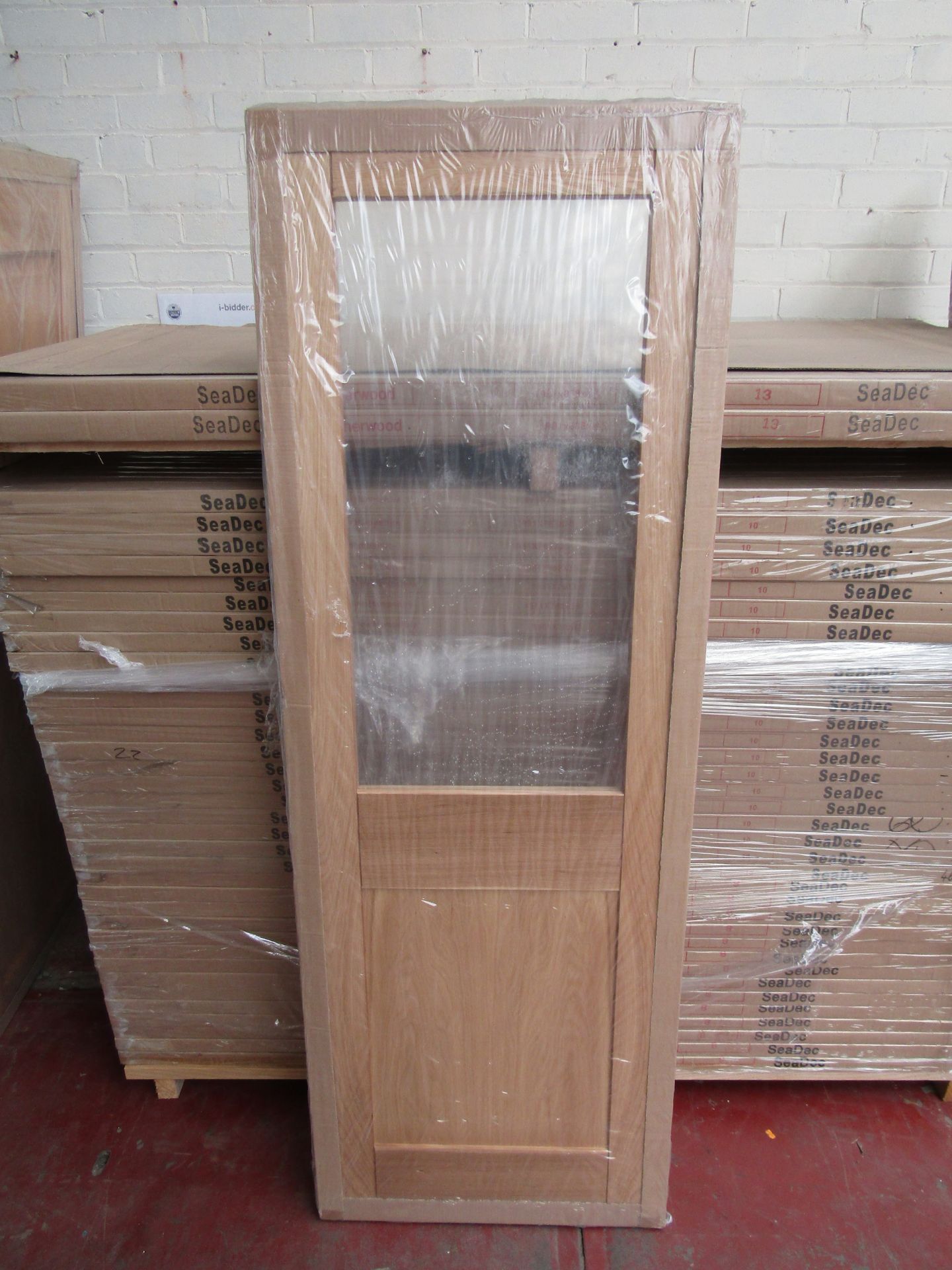 Seadec Whittaker 78 x 27 Clear Glazed Pre Finished to a High Standard Oak Veneer Solid Wood Doors