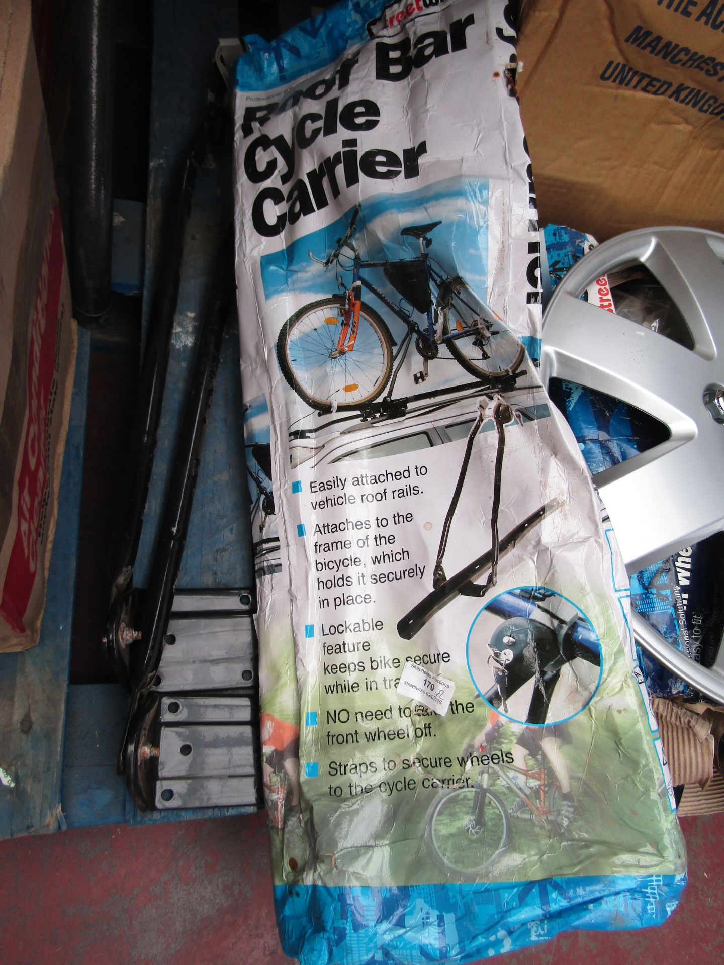 Set of 2 Streetwise of roof Bar Cycle Carriers, one boxed and one not, the unboxed one is missing