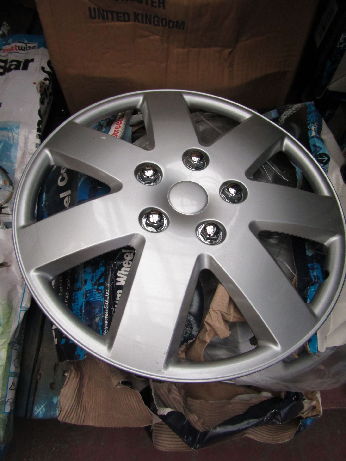Set of 4 Streetwise Premium 15"  wheel trims, new and  boxed, Packaging may have been wet at some