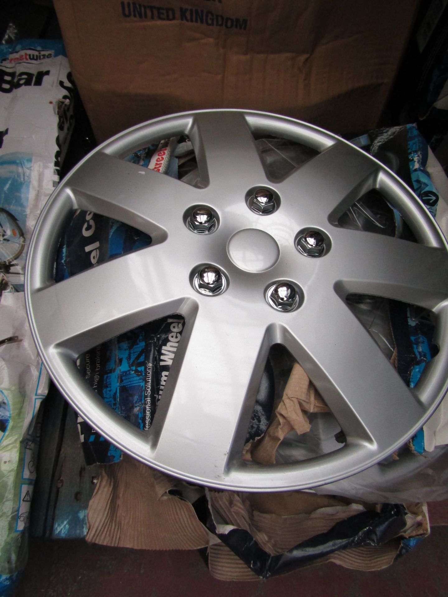 Set of 4 Streetwise Premium 15"  wheel trims, new and  boxed, Packaging may have been wet at some