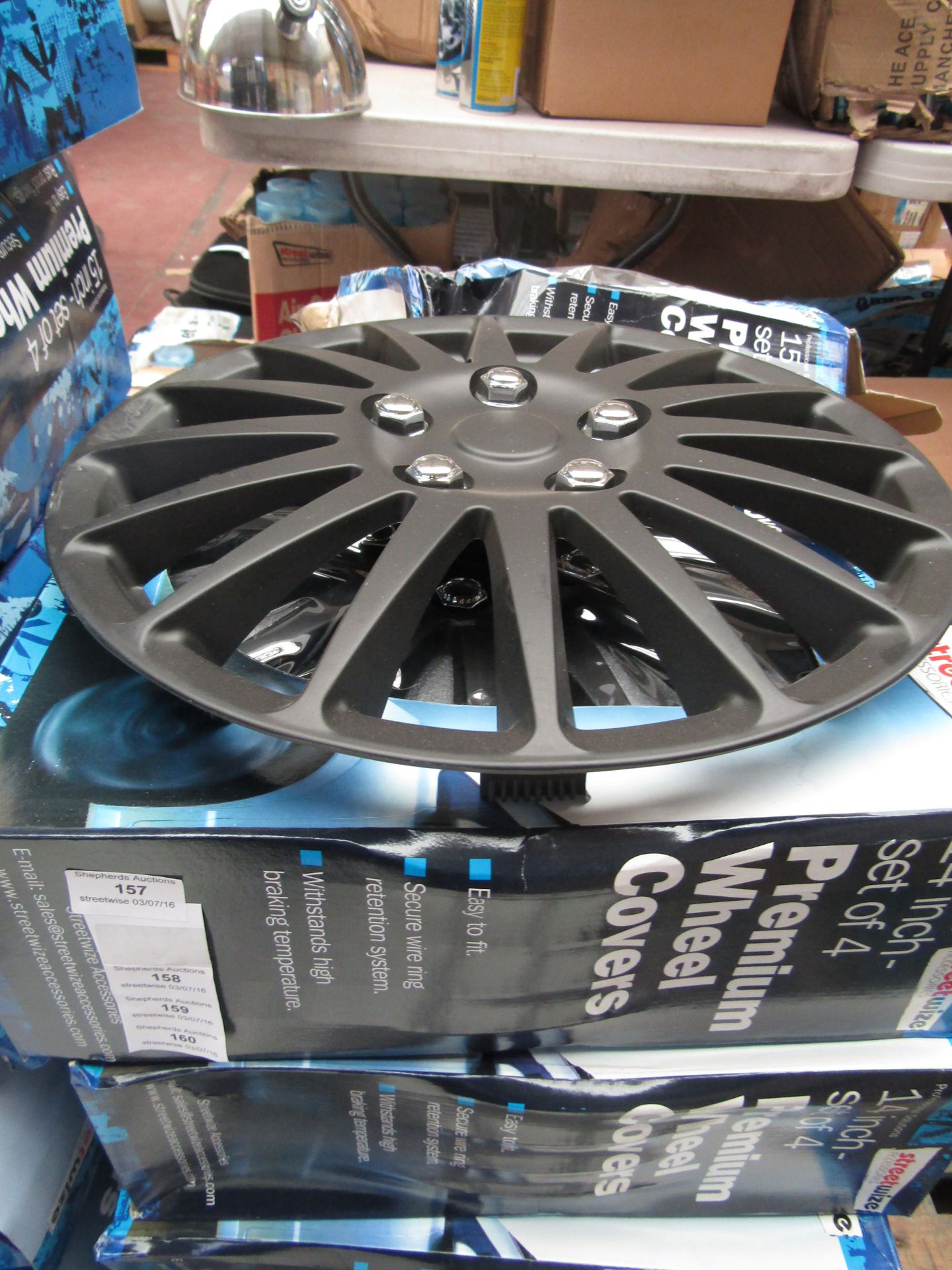 Set of 4 Streetwise Premium 14" Black wheel trims, new and  boxed, Packaging may have been wet at