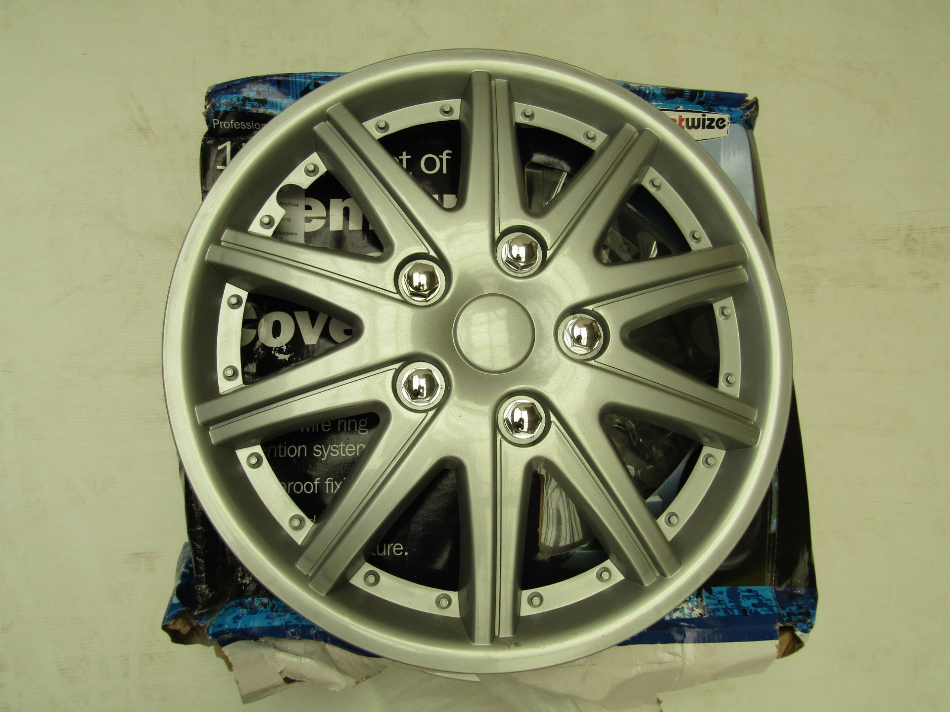 Set of StreetWize 15" Premium Wheel Covers. Brand New.  Packaging may have been wet at some point.