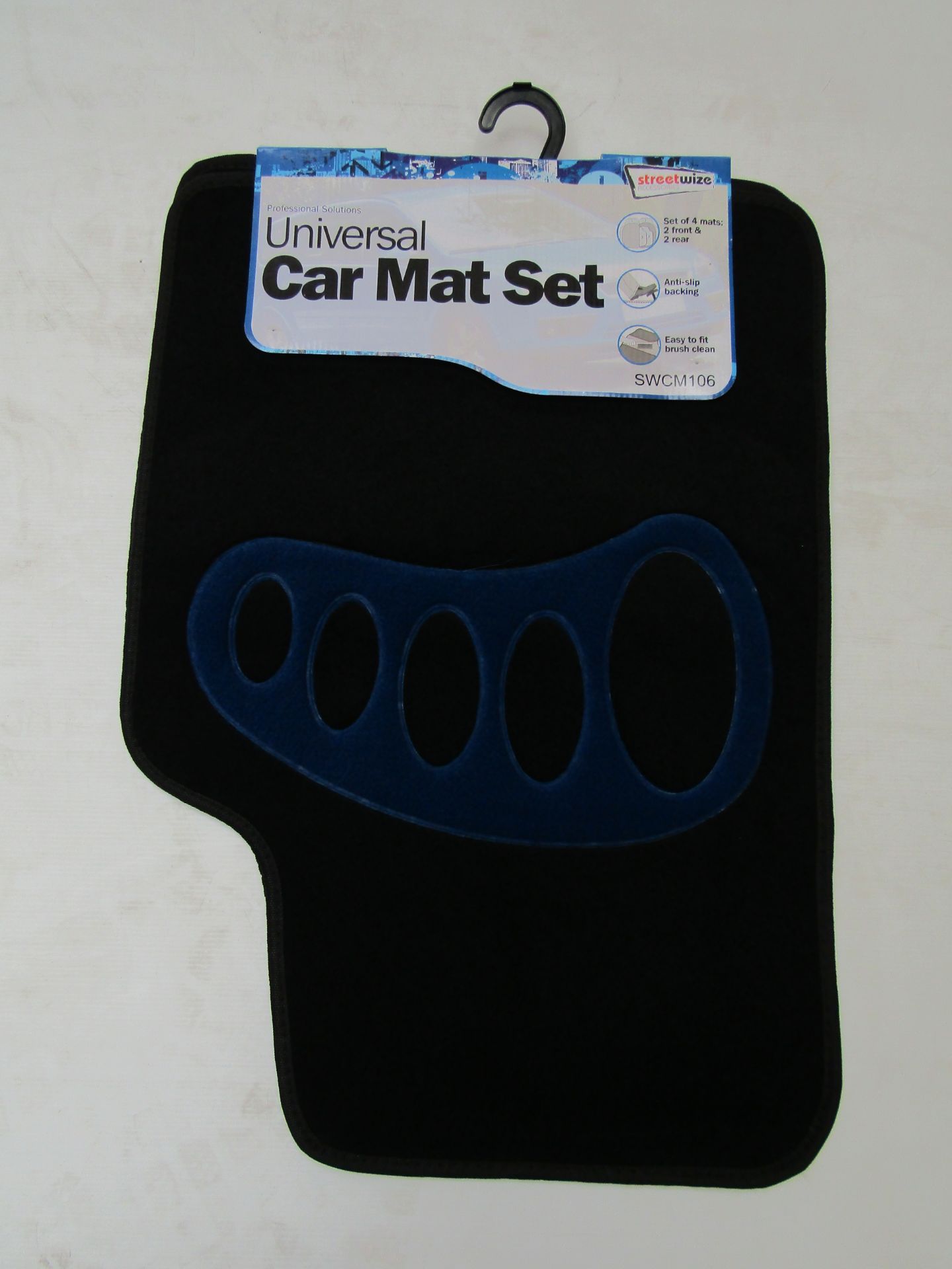 Set of 4 Upholstered car mats with Blue detail, new with tags.