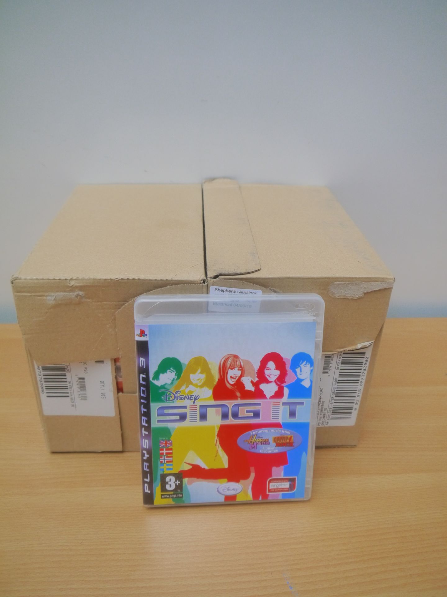 2x Boxes, each containing 15x Disney Sing It Hannah Montana, Camp Rock and more for PlayStation 3.