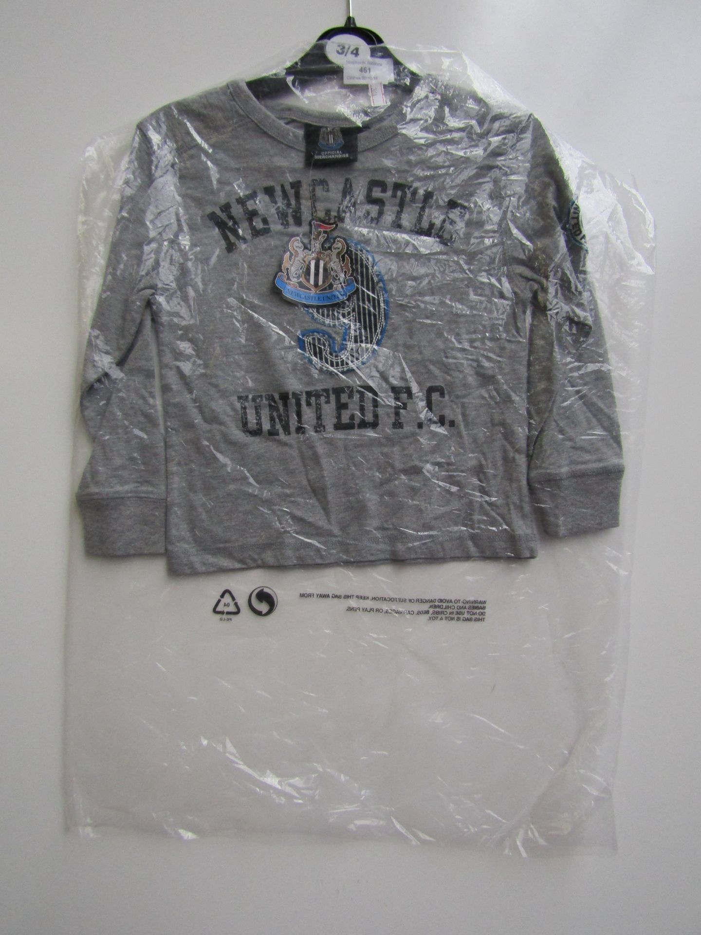 Newcastle United Long Sleeved top Age 3/4, new