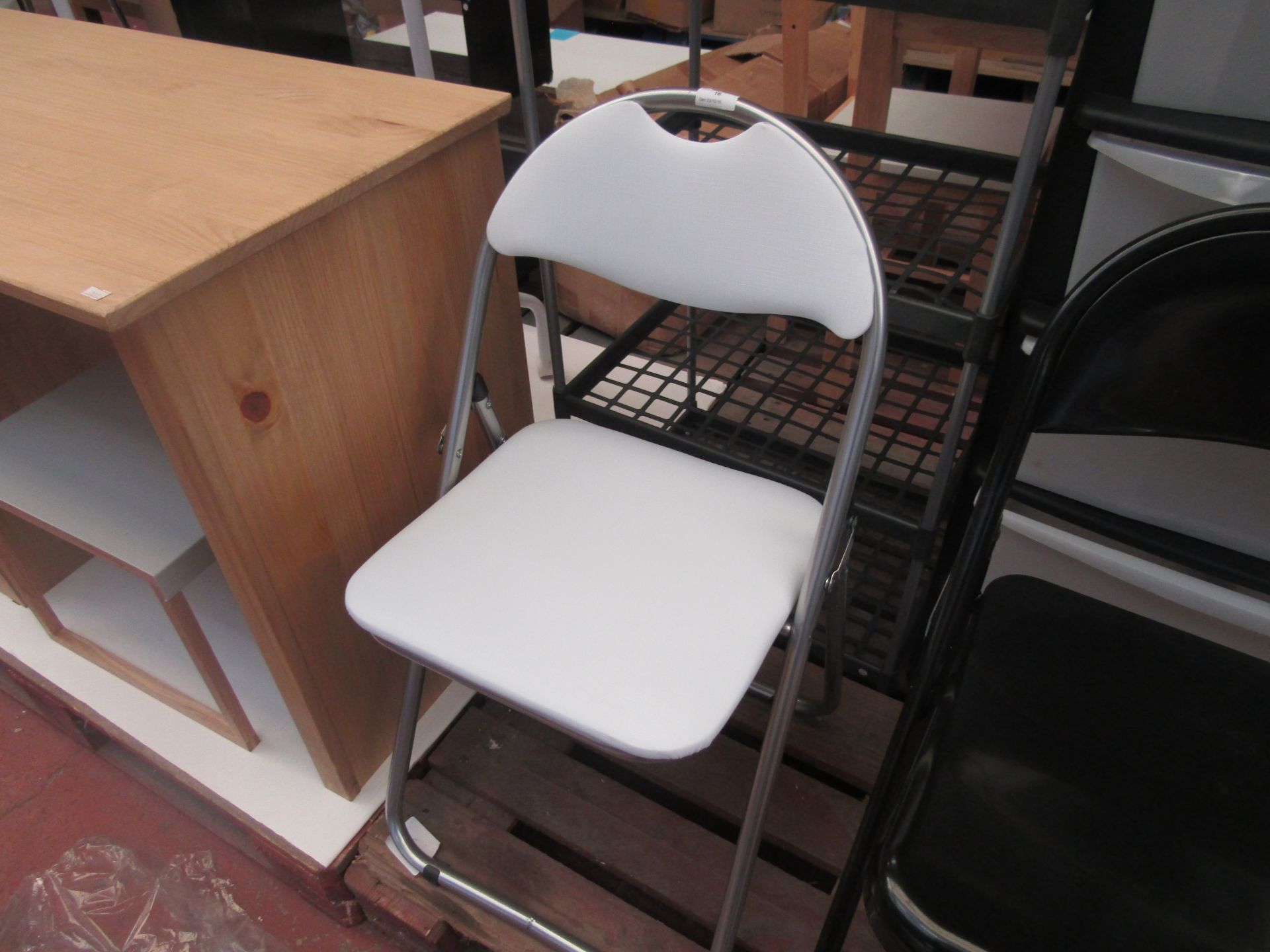 White Cushioned Metal Foldaway Chair.