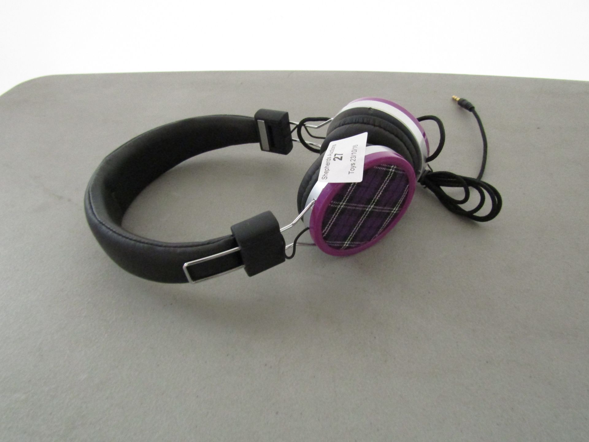 Purple colour headphones, tested working and new (ex display).