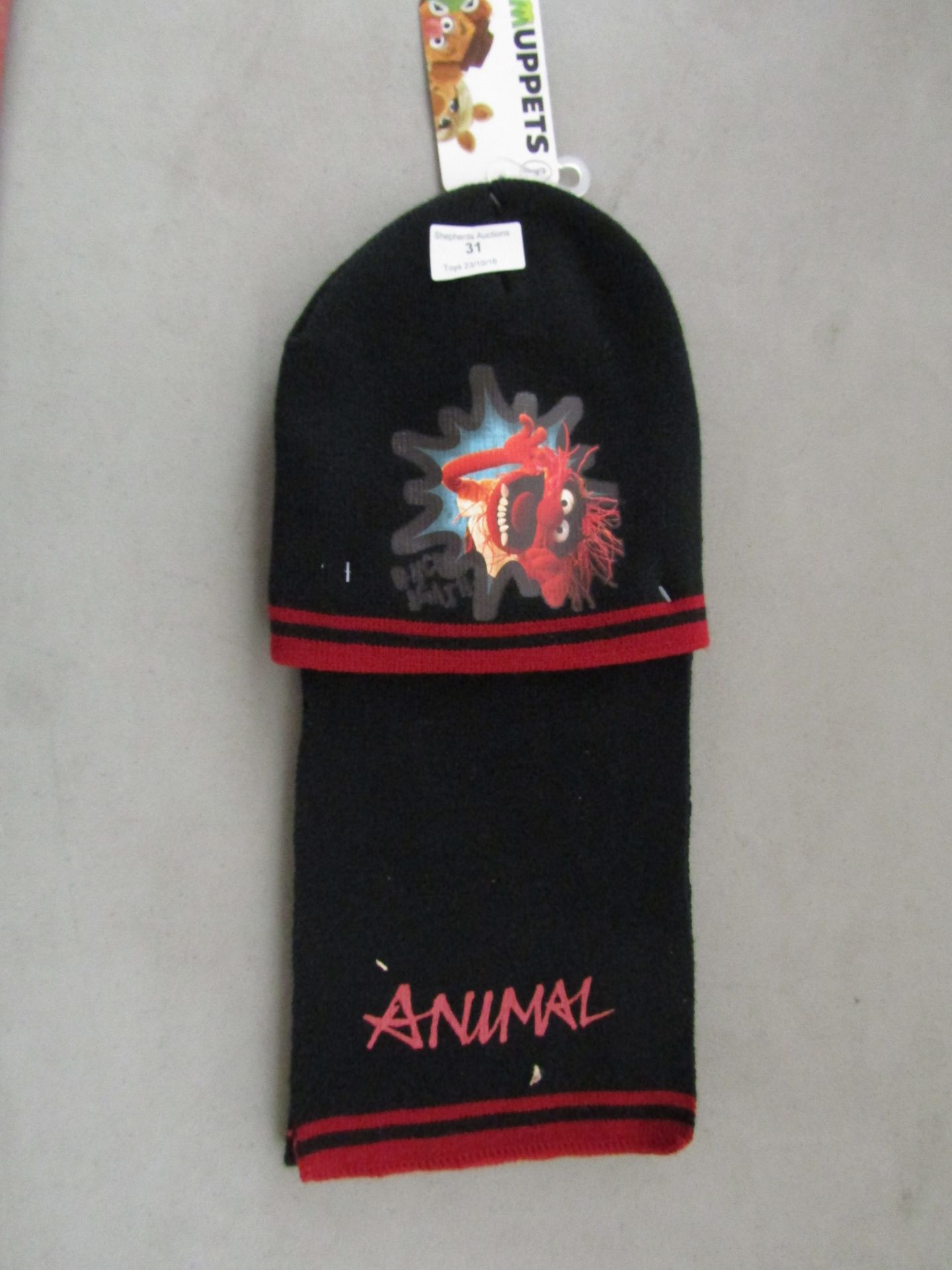 The Muppets 'Animal' design hat and scarf, new with tags.