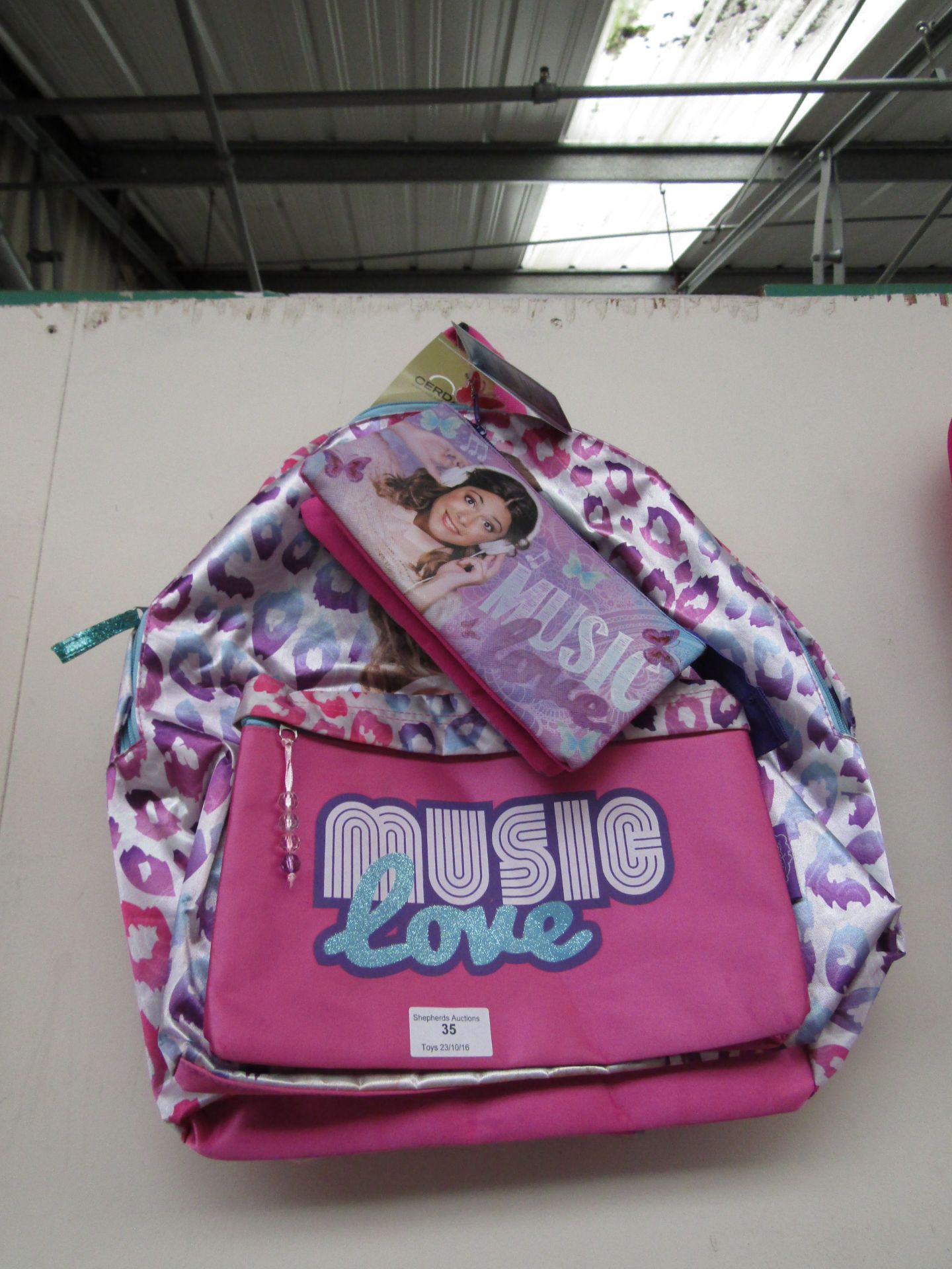 2x Music love items being a backpack and a pencil case. Both new with tags.