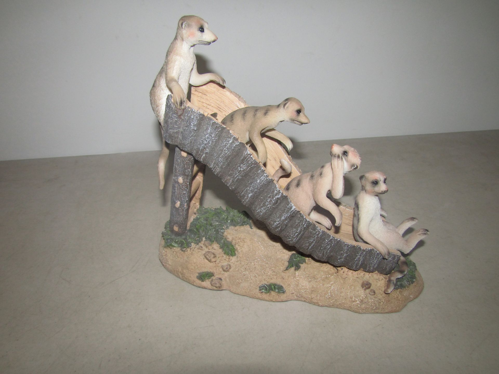 Meerkat slide garden ornament, unchecked and boxed.