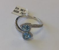 White Gold Aquamarine and Diamond Crossover Ring. RRP £2,160